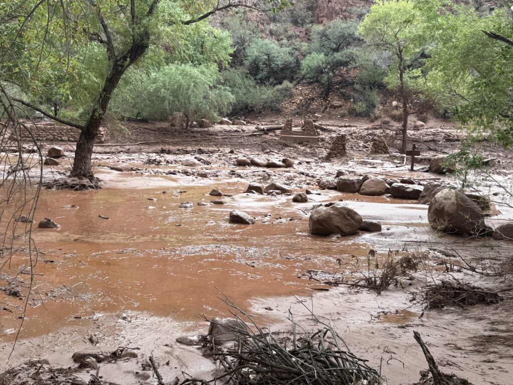 Remnants of stone bridge pylons along Bright Angel Creek after the Aug. 29, 2026 flash flood. NPS Photo/J. Thompson. Public domain.